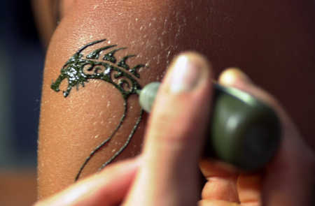 The danger of black henna tattoos is that the black color often is a The danger of black henna tattoos is that the black color often is a