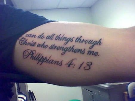 It turns out that that same verse is what is written out on his arm